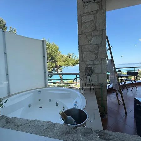 Апартаменты Amelia Seaview &